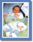 jake in bouncy seat * 1944 x 2592 * (1.33MB)